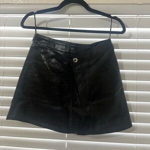 Black leather mini skirt
